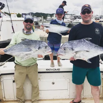 a person holding a fish