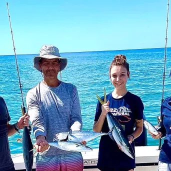 a group of people on a beach